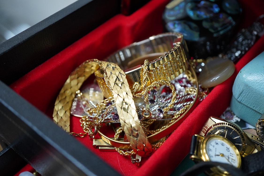 A jewellery box and contents to include a 935 white metal and paste set swallow brooch, silver locket on chain, white metal and costume jewellery, agate necklace and wrist watches including Seiko, Lanco, Lorus and Rotary